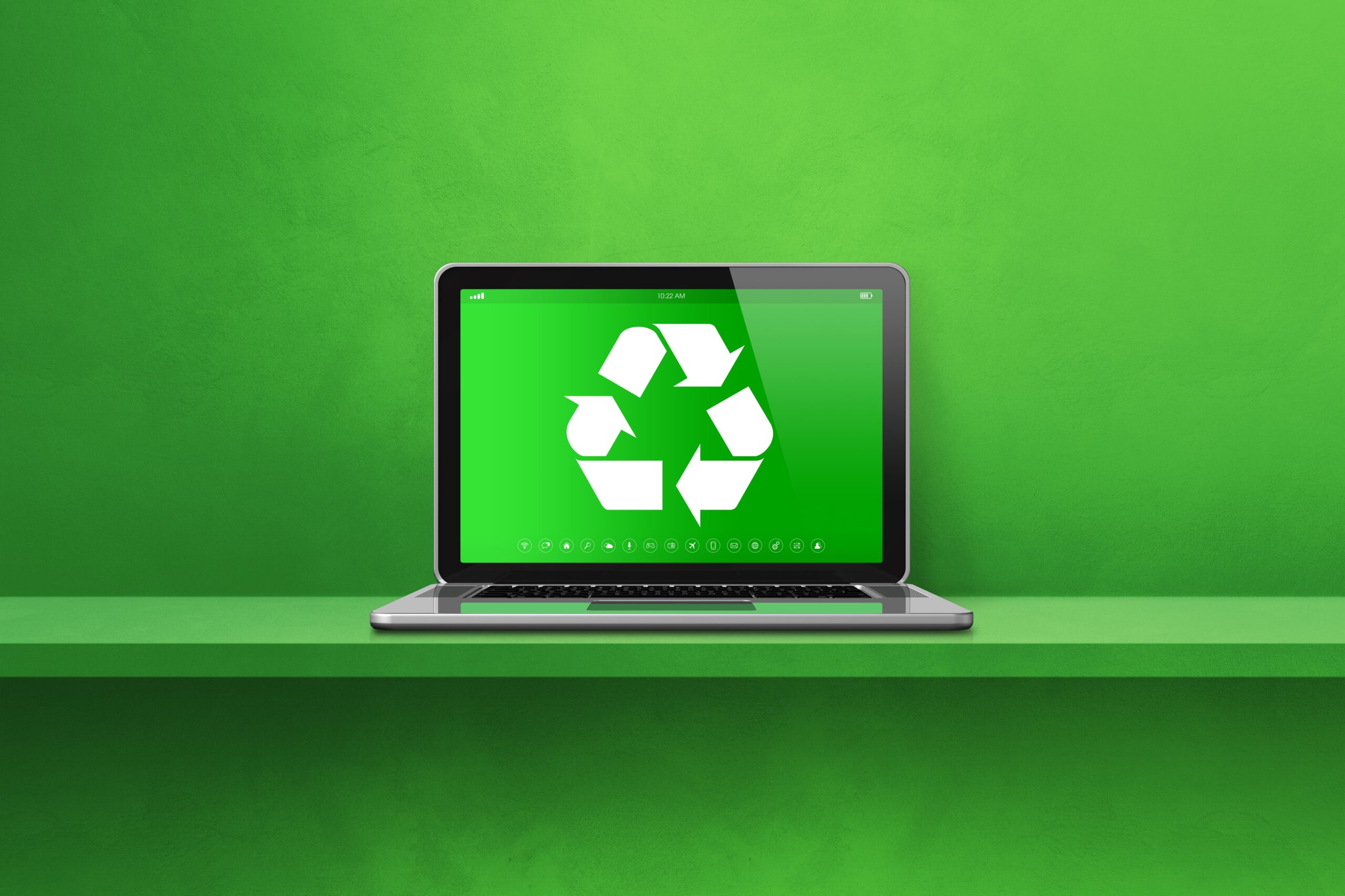 a laptop computer with a recyclable symbol on the screen